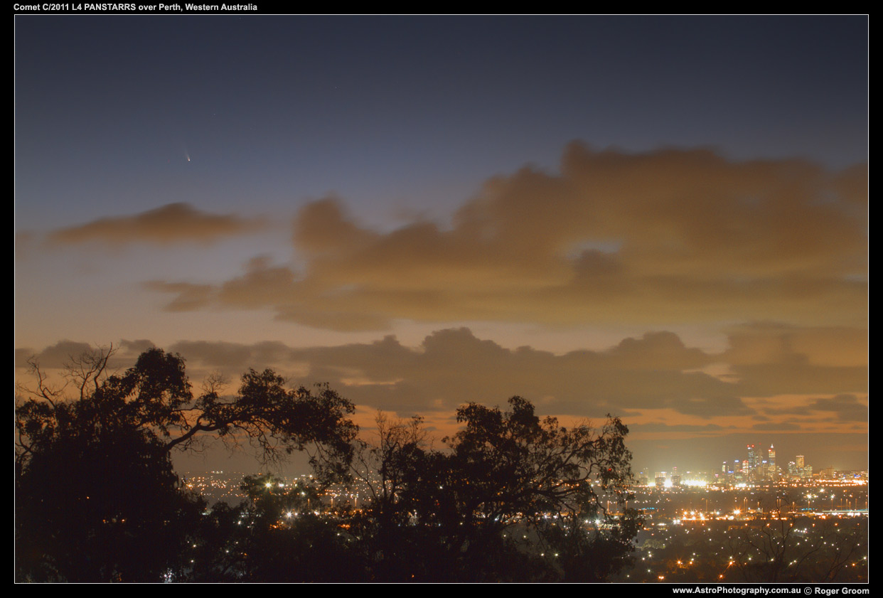 Photograph of Comet C/2011 L4 PANSTARRS over the Perth City Lights