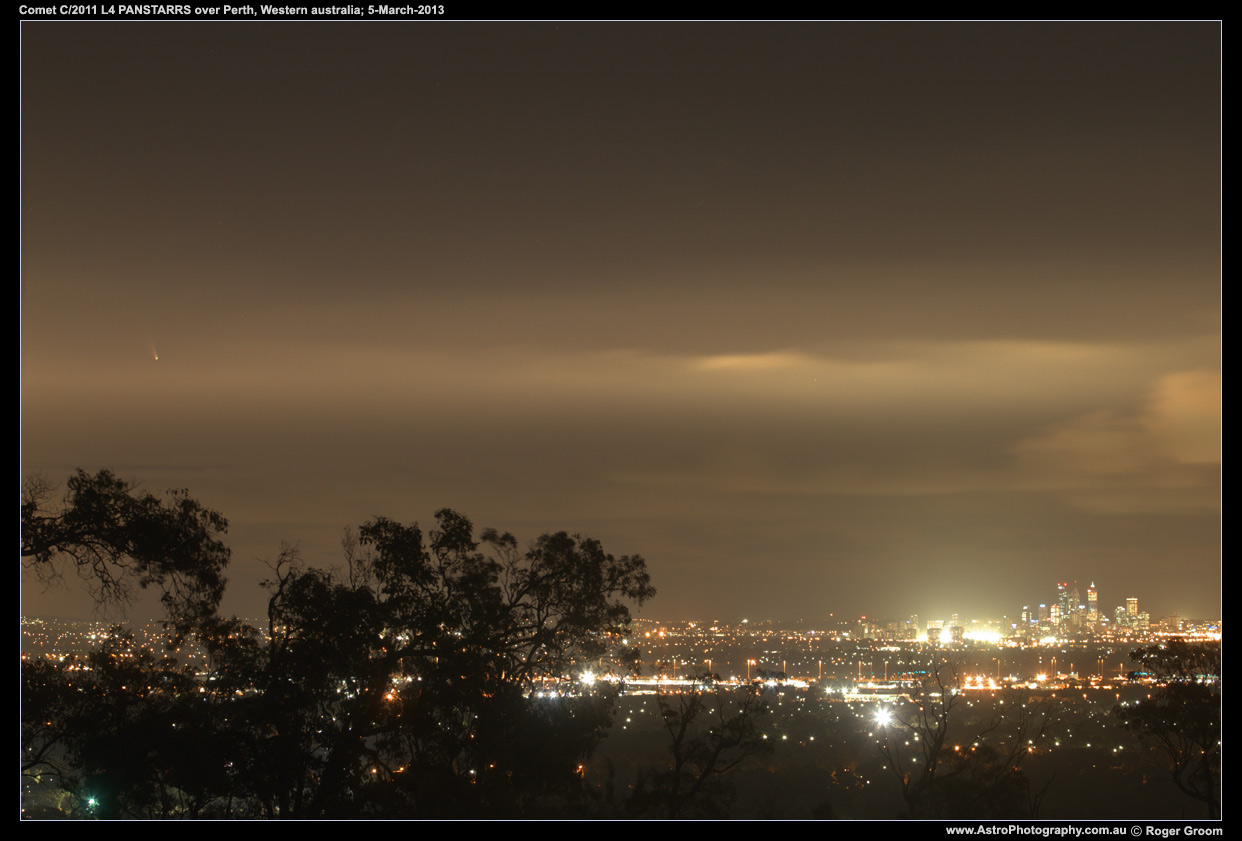 Photograph of Comet C/2011 L4 PANSTARRS over the Perth City