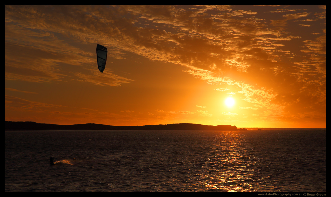 Kitesurfing in a Golden Sunset.