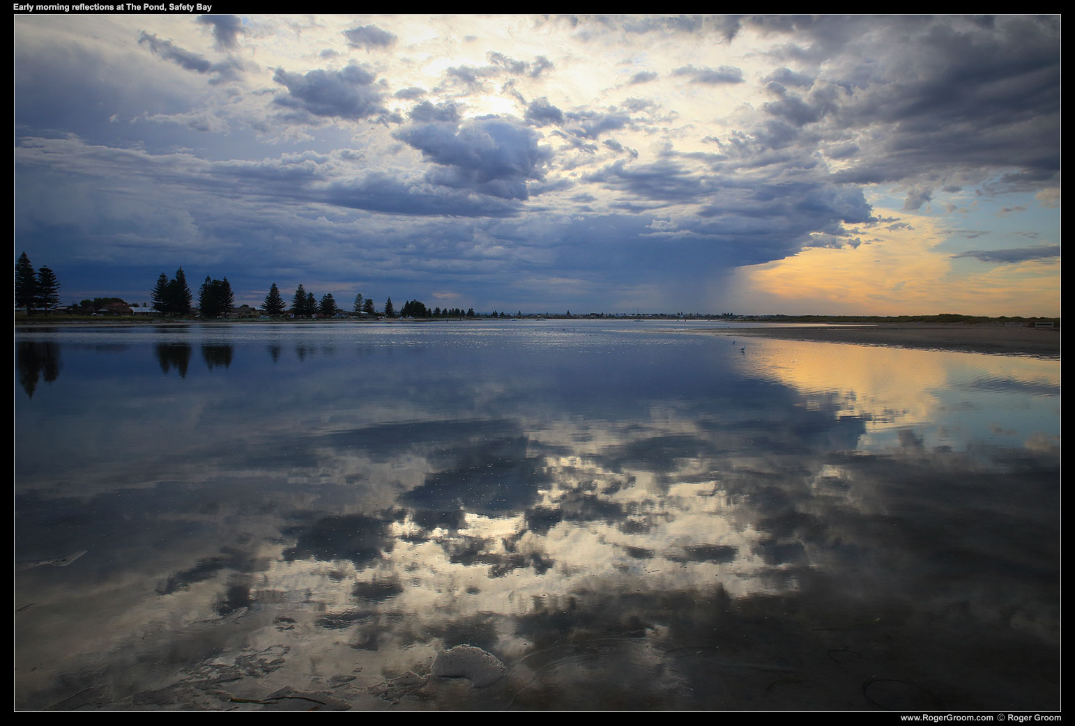 Early morning reflections in The Pond at Safety Bay / Tern Island with storm clouds in the distance.